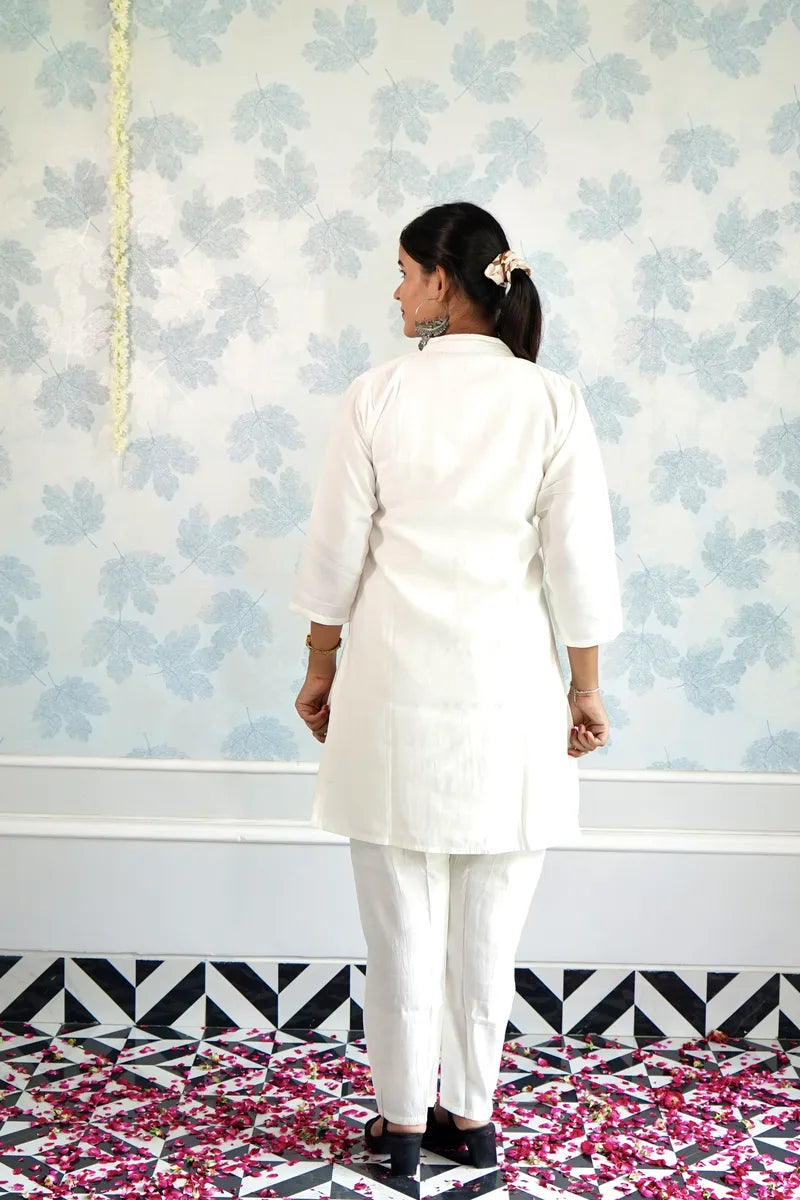 PURE BLOOM: WHITE COTTON SET WITH FLORAL MOTIFS