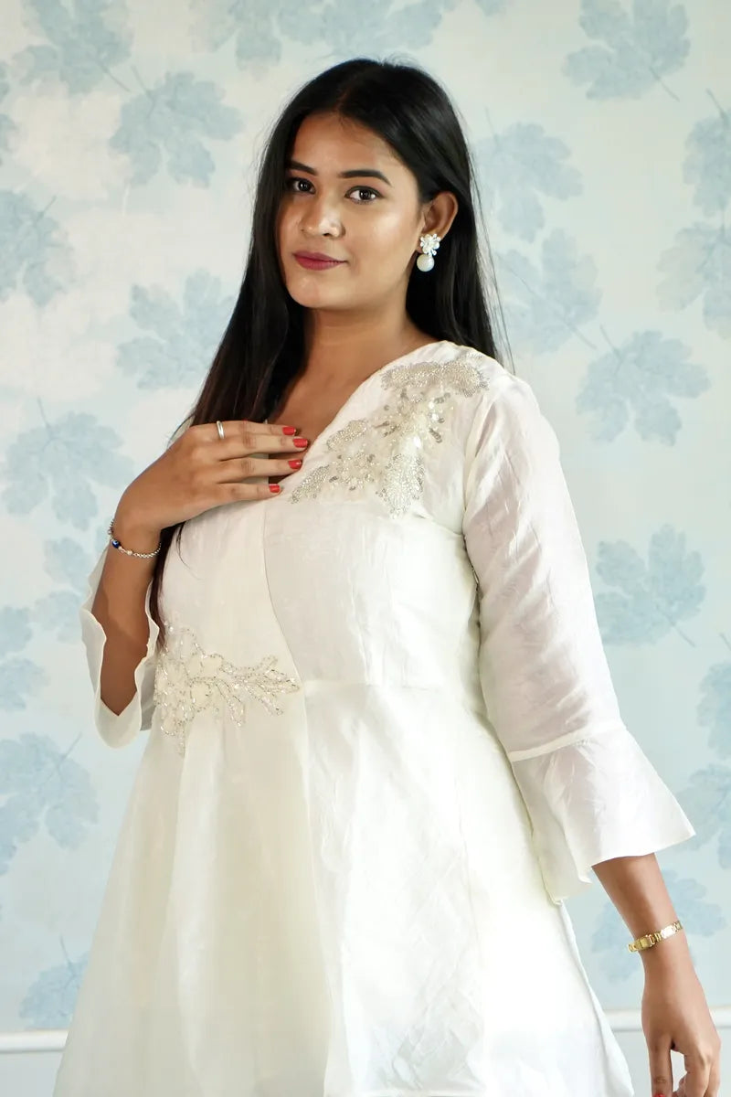 IVORY ELEGANCE LAYERED CORD SET WITH PEARL EMBELLISHMENTS