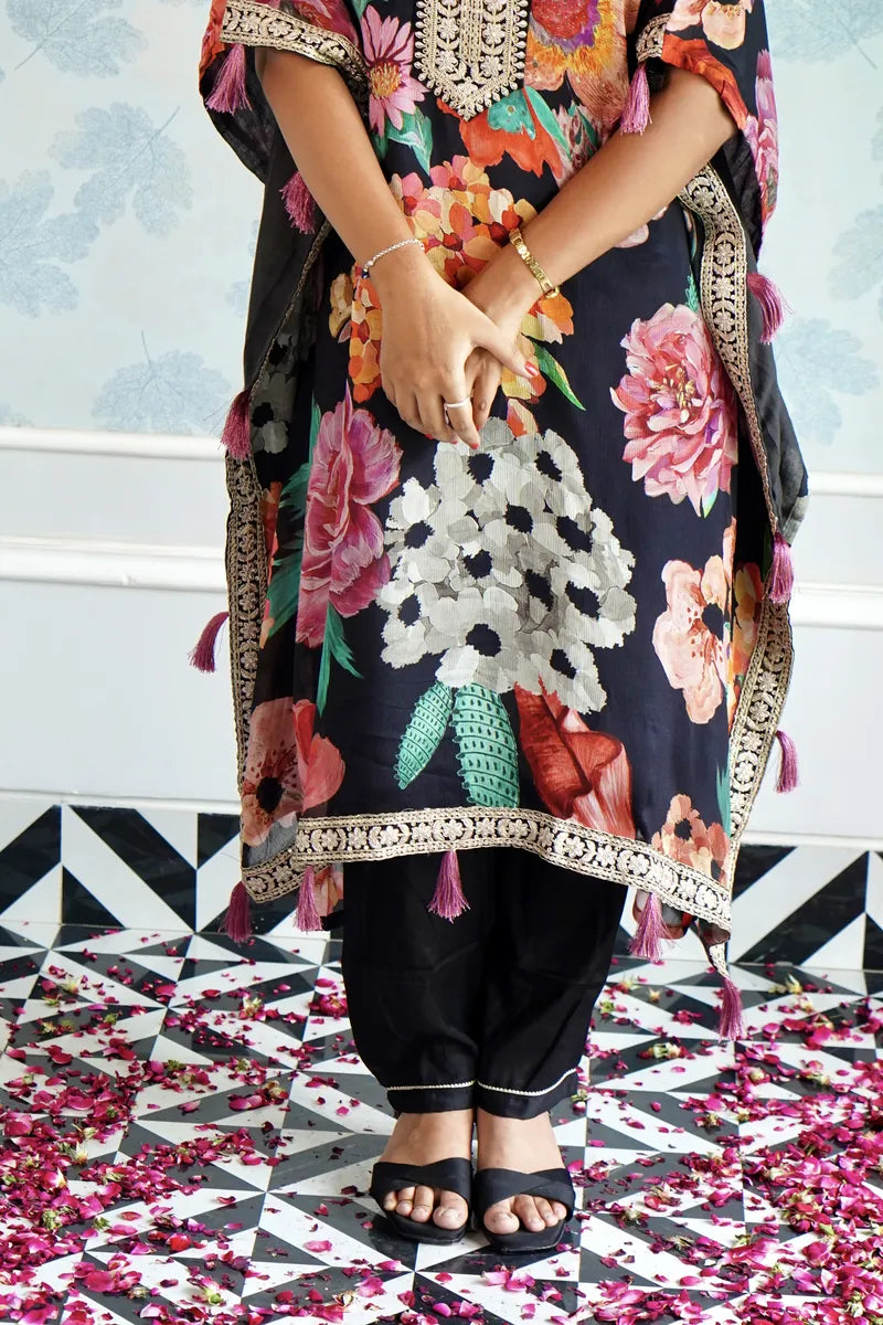 BLOOMING ROYALE – BLACK FLORAL KAFTAAN WITH TASSEL DETAILING
