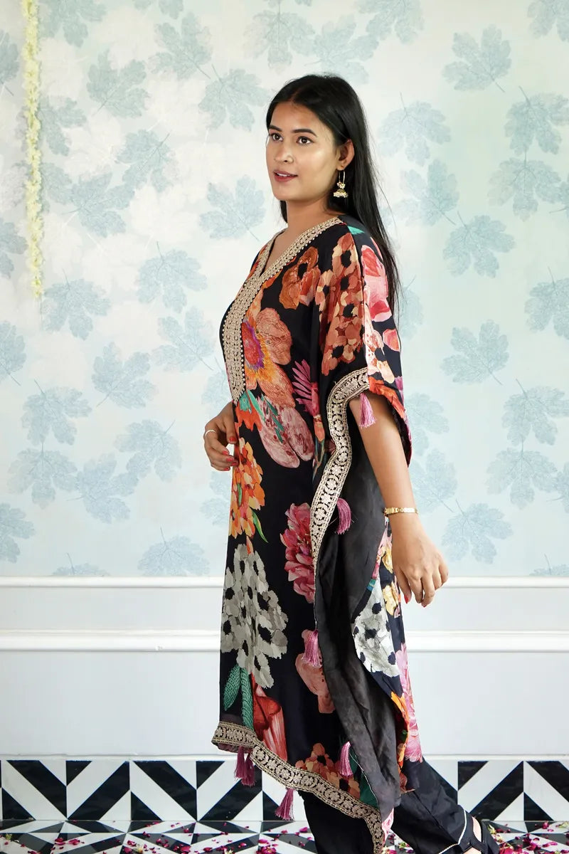 BLOOMING ROYALE – BLACK FLORAL KAFTAAN WITH TASSEL DETAILING