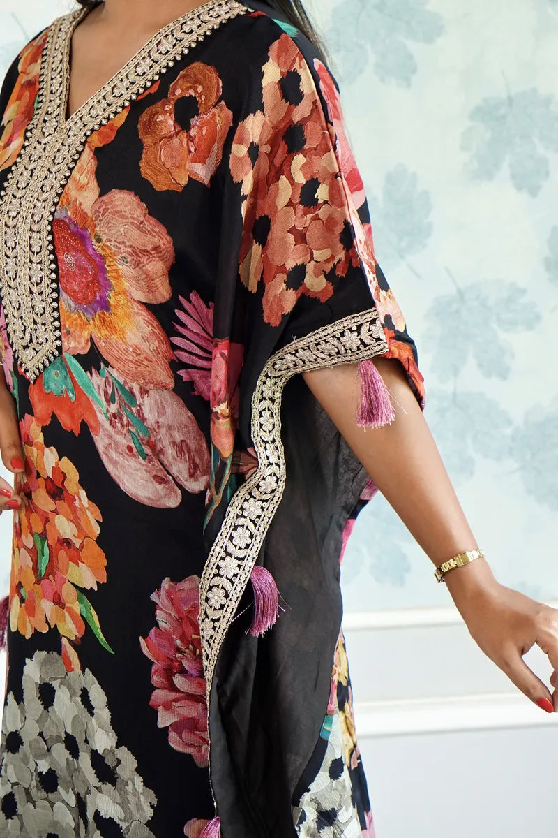 BLOOMING ROYALE – BLACK FLORAL KAFTAAN WITH TASSEL DETAILING