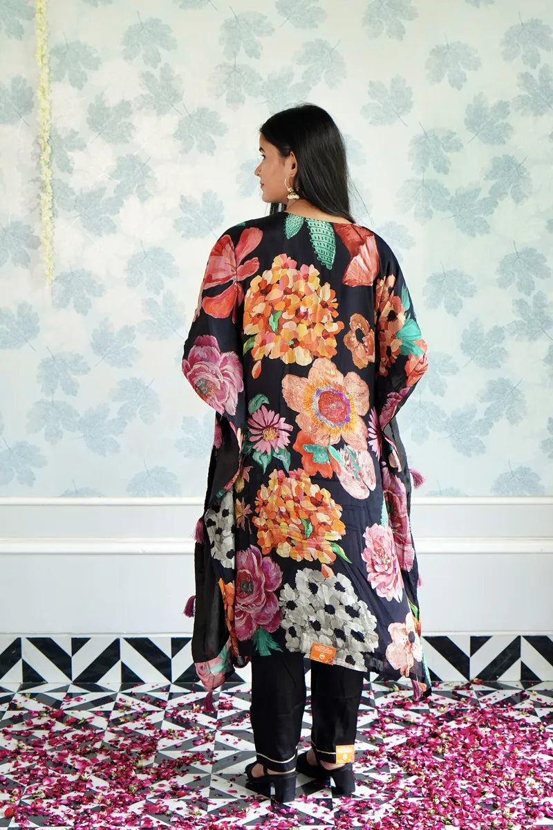 BLOOMING ROYALE – BLACK FLORAL KAFTAAN WITH TASSEL DETAILING