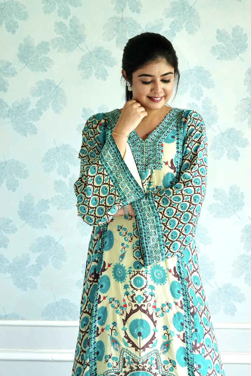 TURQUOISE AND CREAM PRINTED KURTA SET WITH ETHNIC FLORAL MOTIFS & STATEMENT SLEEVES