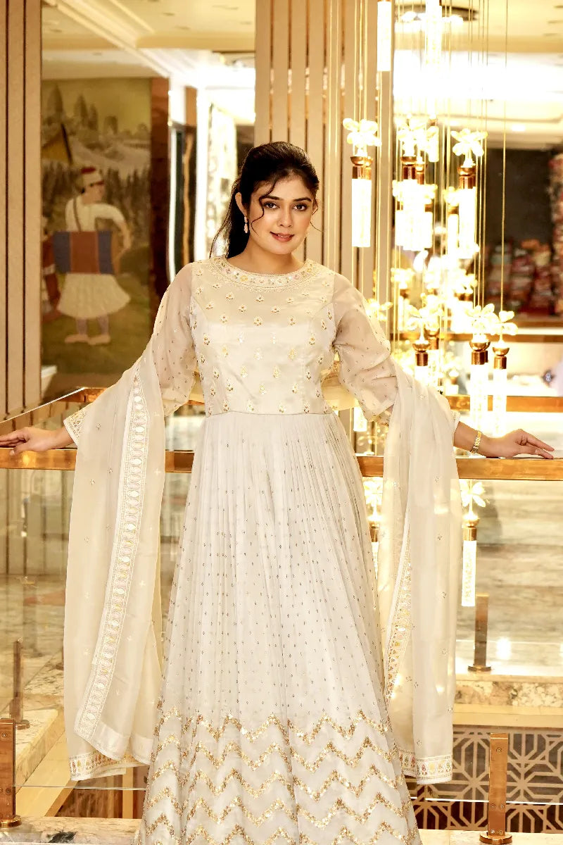 TIMELESS GLAMOUR OFF WHITE COLOR TRADITIONAL GOWN