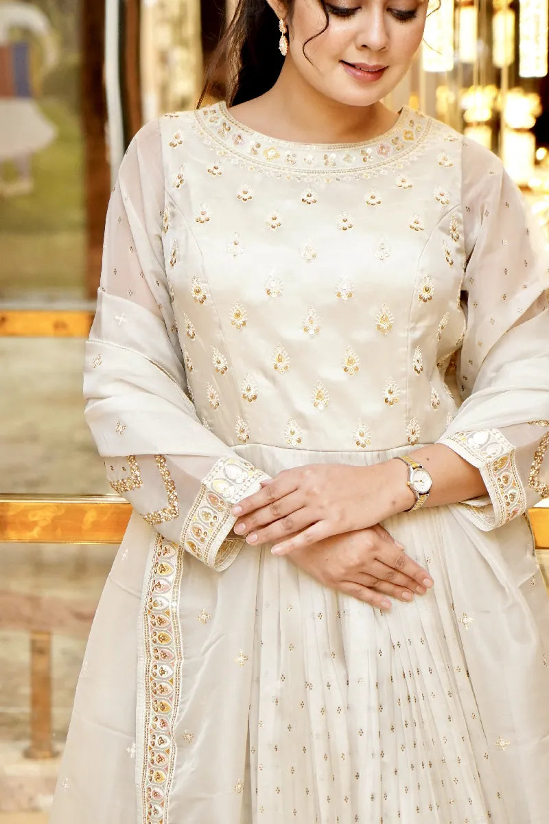 TIMELESS GLAMOUR OFF WHITE COLOR TRADITIONAL GOWN