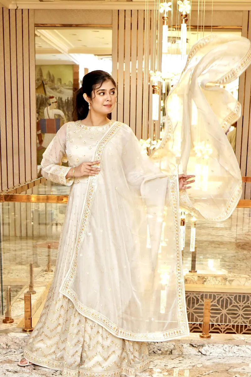 TIMELESS GLAMOUR OFF WHITE COLOR TRADITIONAL GOWN