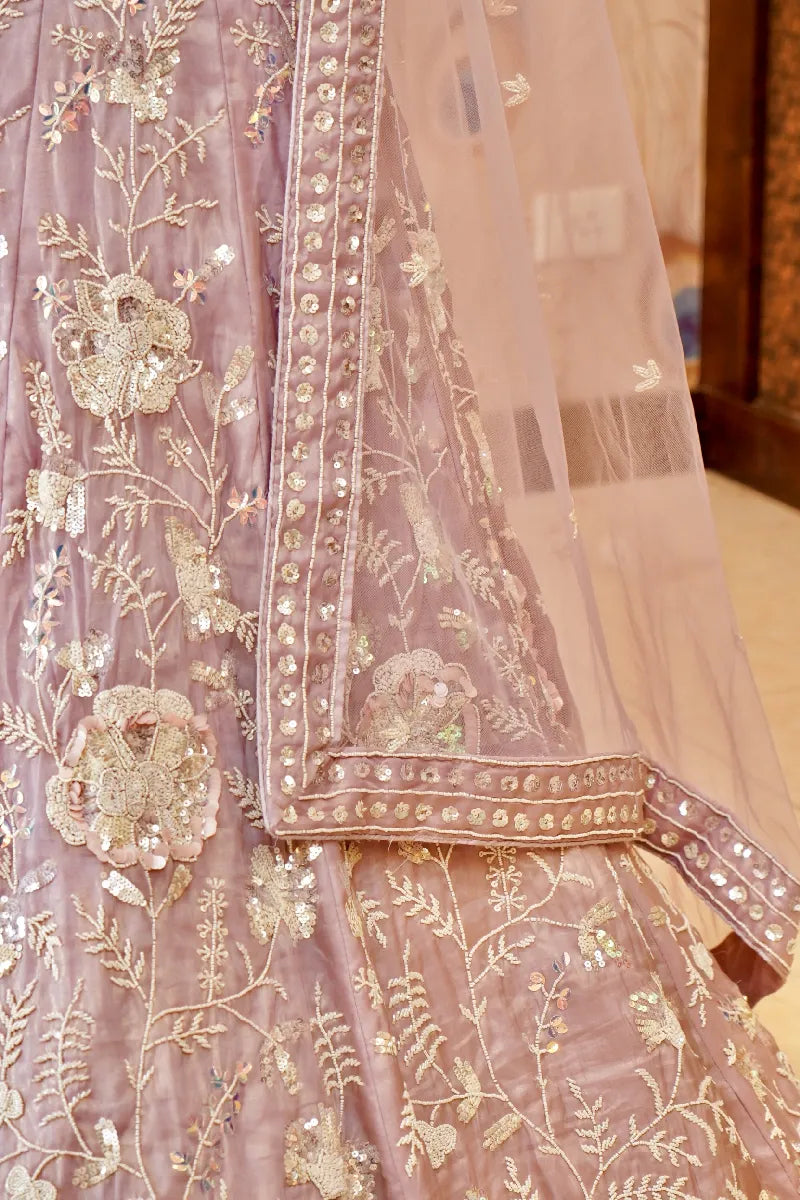 PURPLE COLOR SEQUENCE AND PEARL HAND WORK BRIDAL LEHENGA