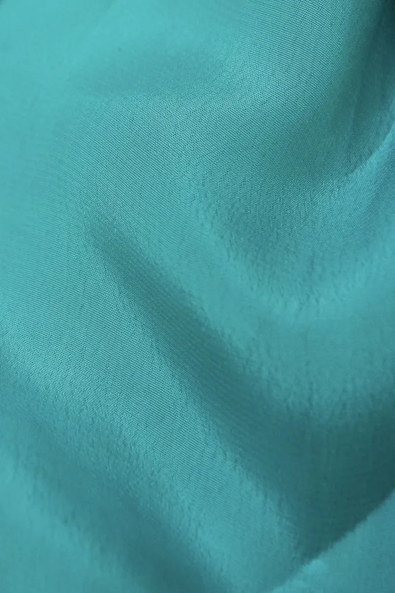 BANARASI MUNGA SILK SEA GREEN COLOR UNSTITCHED SUIT