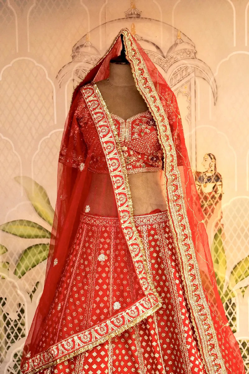 RAW SILK BRIDAL RED COLOR LEHENGA WITH HEAVY CAN-CAN FLARE AND ZARDOSI WORK