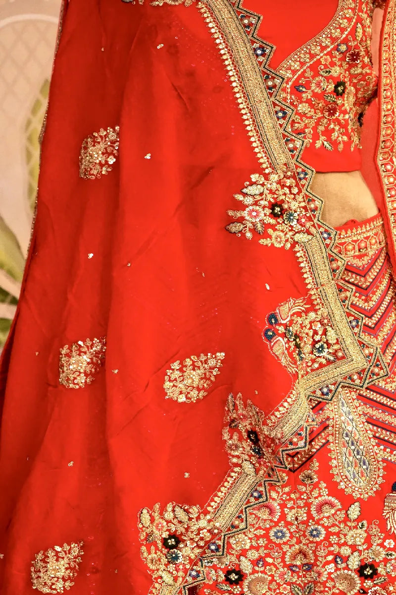 DESIGNER BRIDAL LEHENGA WITH HANDCRAFTED DETAILING RAW SILK RED COLOR