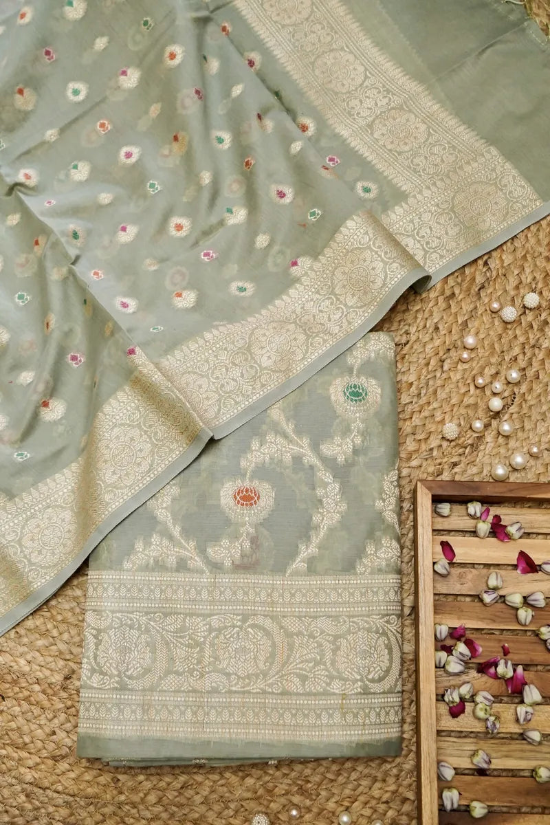 BANARASI SILK LITE PISTA GREEN COLOR UNSTITCHED SUIT MATERIAL