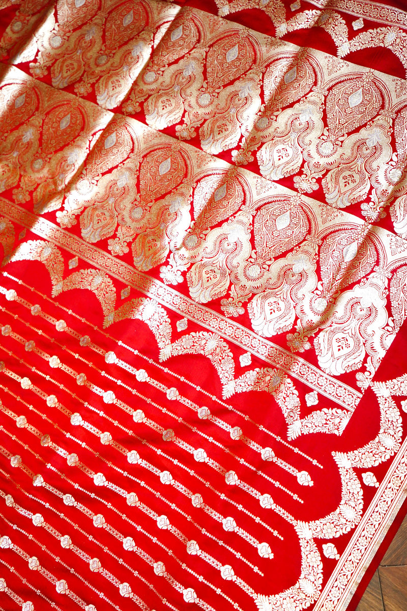 Red Silk Saree with Silver+Golden Zari Product Information
Product code
0011021920 (1-V-406)
Fabric
Banarasi silk
Saree Colour
Red
Blouse
Red
Care instructions
Dry Wash
AbouRed Silk SareeSaree