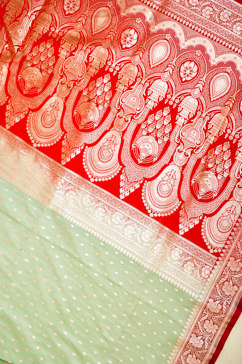PESTLE PISTA GREEN SILK SAREE WITH RED BORDERProduct Information
Product code
0011049219(9854-V-406)
Fabric
Banarasi silk
Saree Colour
Pestle Pista Green with Red Border
Blouse
Red
CarePESTLE PISTA GREEN SILK SAREESaree