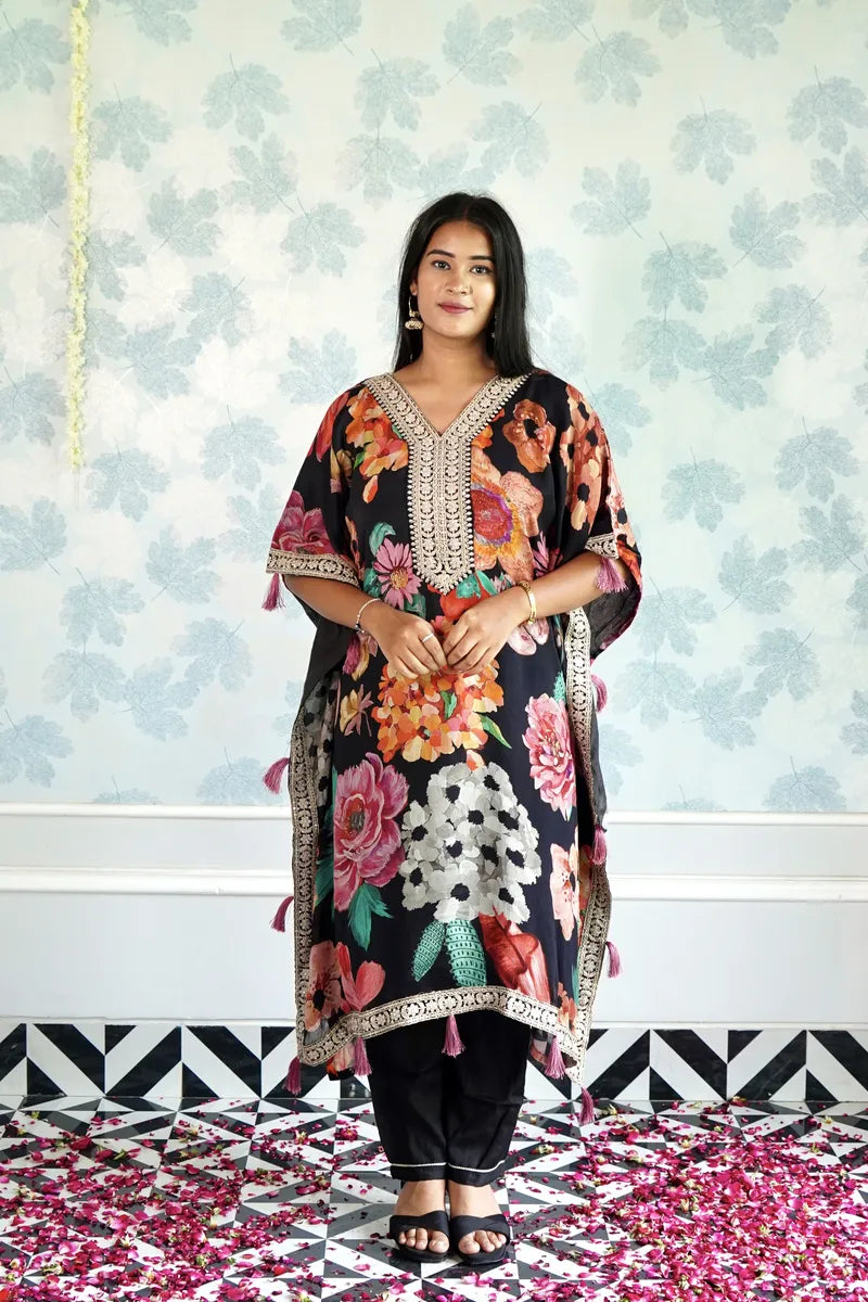 BLOOMING ROYALE – BLACK FLORAL KAFTAAN WITH TASSEL DETAILING