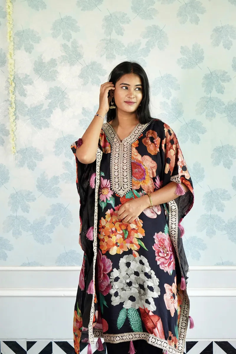 BLOOMING ROYALE – BLACK FLORAL KAFTAAN WITH TASSEL DETAILING