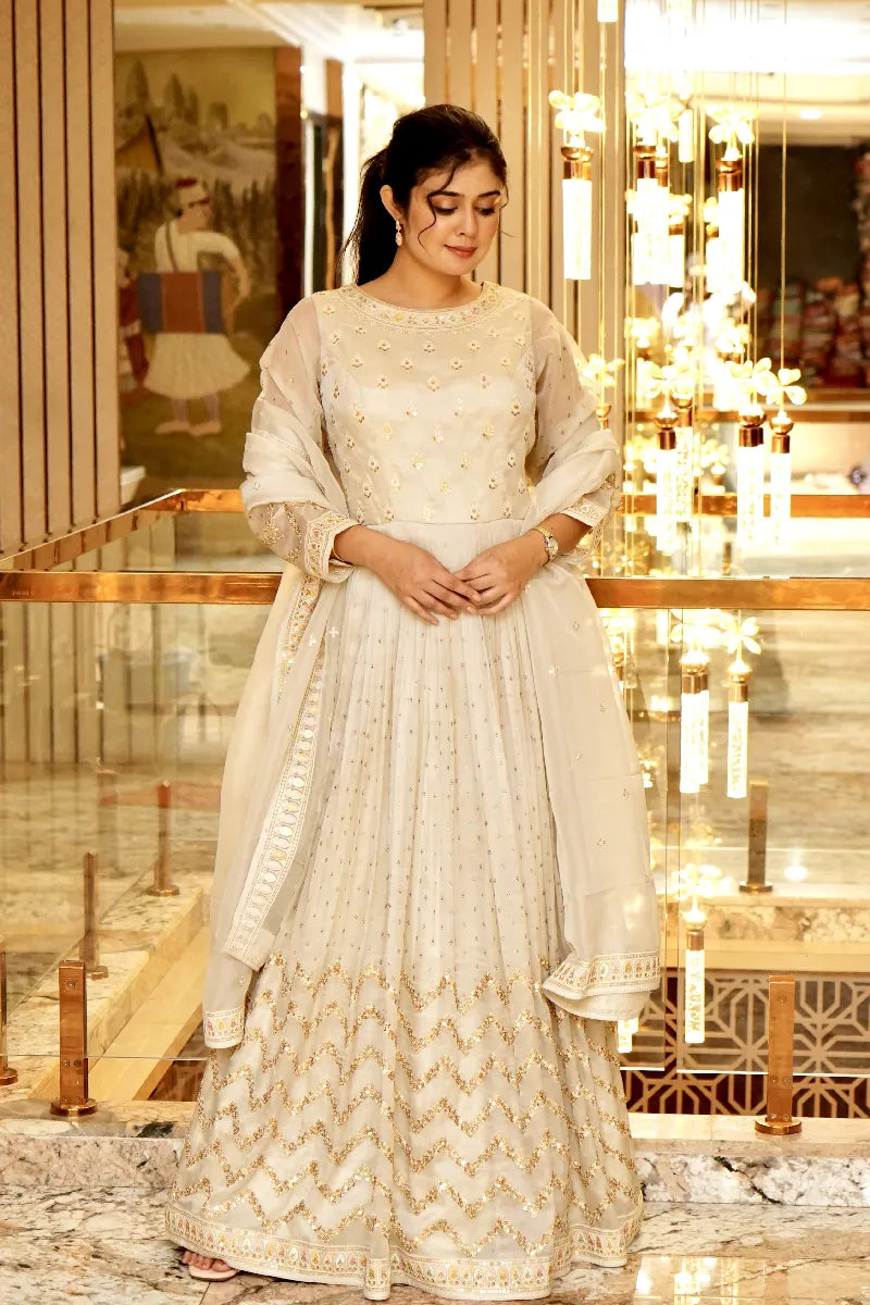 TIMELESS GLAMOUR OFF WHITE COLOR TRADITIONAL GOWN