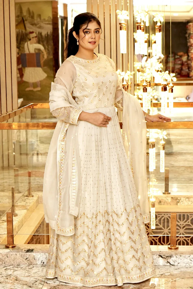 TIMELESS GLAMOUR OFF WHITE COLOR TRADITIONAL GOWN