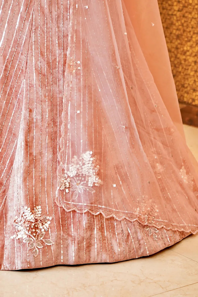 PEACH COLOR SEQUENCE AND PEARL WORK BRIDAL LEHENGA