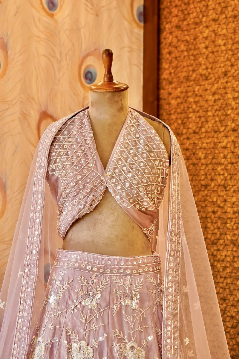 PURPLE COLOR SEQUENCE AND PEARL HAND WORK BRIDAL LEHENGA