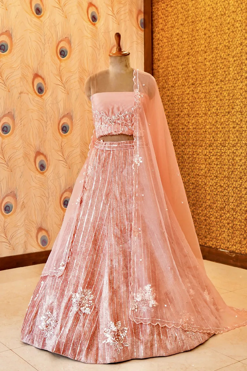 PEACH COLOR SEQUENCE AND PEARL WORK BRIDAL LEHENGA