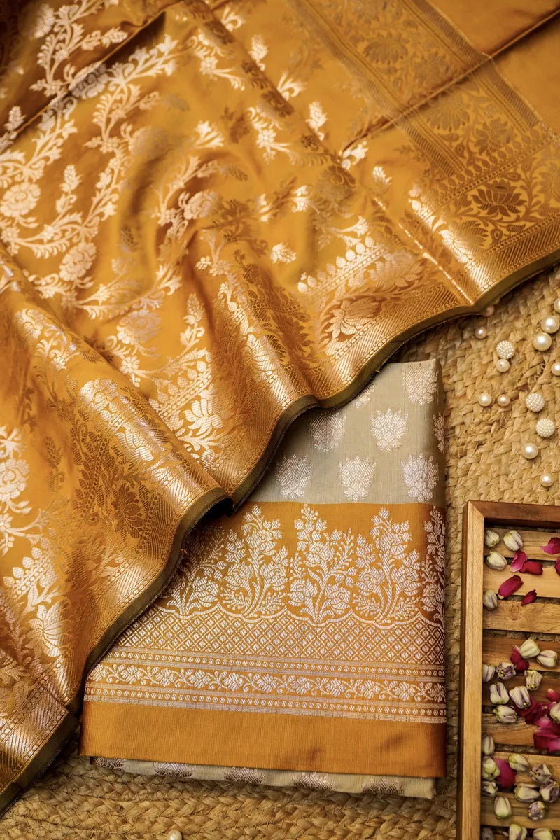 BANARASI SILK CHEEKU WITH ORANGE COLOR UNSTITCHED SUIT MATERIAL