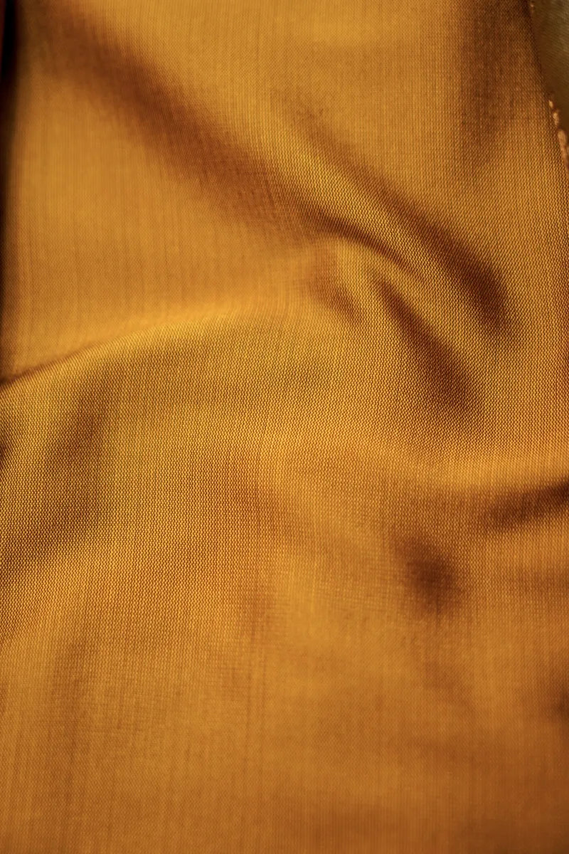 BANARASI SILK CHEEKU WITH ORANGE COLOR UNSTITCHED SUIT MATERIAL