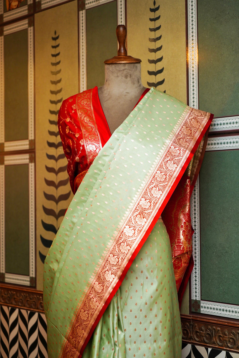 PESTLE PISTA GREEN SILK SAREE WITH RED BORDER