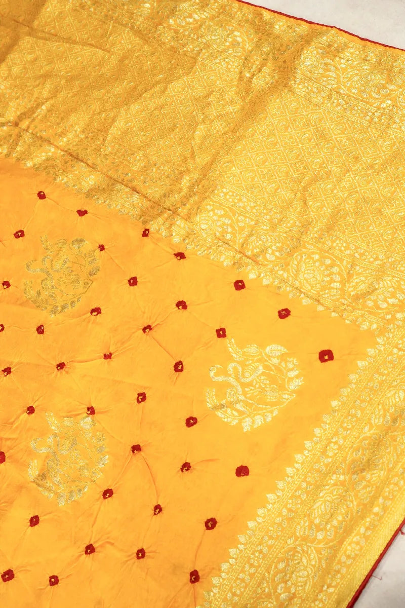 YELLOW COLOR GAJJI SILK BANDHANI SAREE